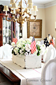 DIY fourth of July decorations: white wooden box with geraniums